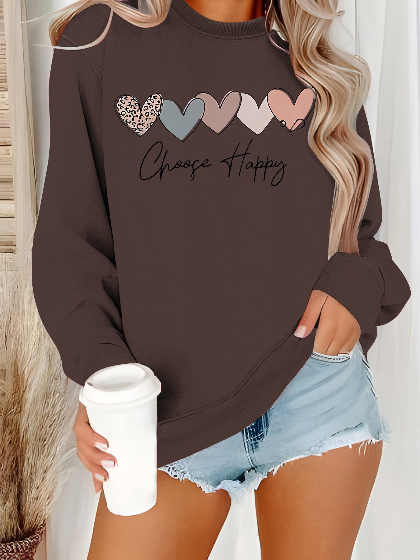 Sweatshirt with heart-shaped pattern print