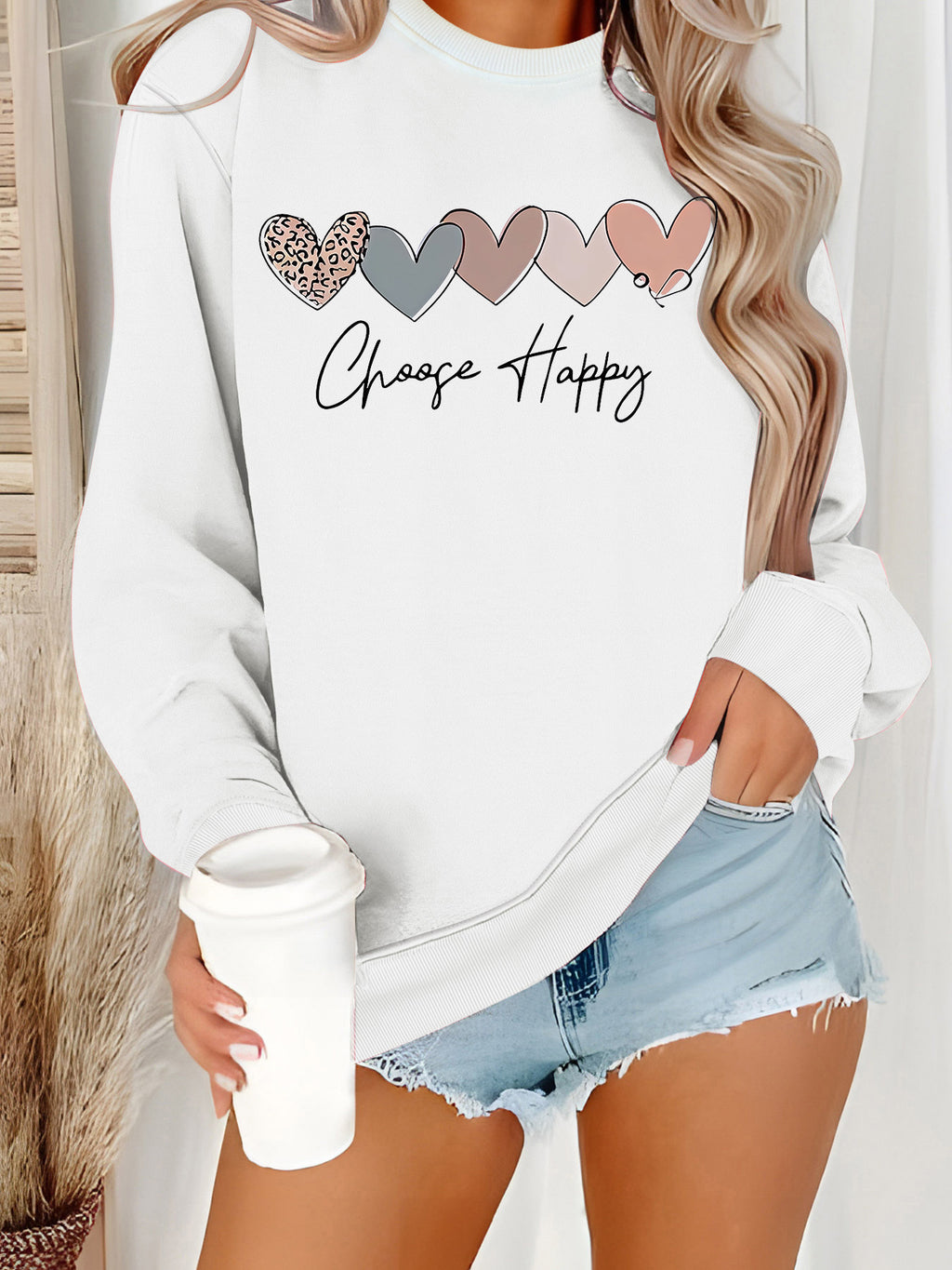 Sweatshirt with heart-shaped pattern print